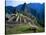 Llama Rests Overlooking Ruins of Machu Picchu in the Andes Mountains, Peru-Jim Zuckerman-Stretched Canvas