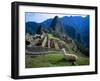 Llama Rests Overlooking Ruins of Machu Picchu in the Andes Mountains, Peru-Jim Zuckerman-Framed Premium Photographic Print