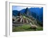 Llama Rests Overlooking Ruins of Machu Picchu in the Andes Mountains, Peru-Jim Zuckerman-Framed Premium Photographic Print