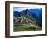 Llama Rests Overlooking Ruins of Machu Picchu in the Andes Mountains, Peru-Jim Zuckerman-Framed Photographic Print