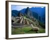 Llama Rests Overlooking Ruins of Machu Picchu in the Andes Mountains, Peru-Jim Zuckerman-Framed Photographic Print