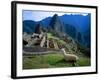 Llama Rests Overlooking Ruins of Machu Picchu in the Andes Mountains, Peru-Jim Zuckerman-Framed Photographic Print