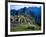 Llama Rests Overlooking Ruins of Machu Picchu in the Andes Mountains, Peru-Jim Zuckerman-Framed Photographic Print