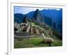 Llama Rests Overlooking Ruins of Machu Picchu in the Andes Mountains, Peru-Jim Zuckerman-Framed Photographic Print