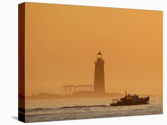 Lobster Boat Passes Ram Island Ledge Light at Dawn Off Cape Elizabeth, Maine-null-Stretched Canvas