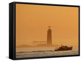 Lobster Boat Passes Ram Island Ledge Light at Dawn Off Cape Elizabeth, Maine-null-Framed Stretched Canvas