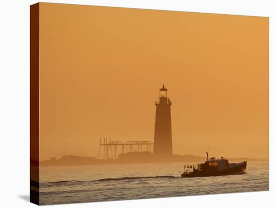 Lobster Boat Passes Ram Island Ledge Light at Dawn Off Cape Elizabeth, Maine-null-Stretched Canvas