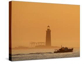 Lobster Boat Passes Ram Island Ledge Light at Dawn Off Cape Elizabeth, Maine-null-Stretched Canvas