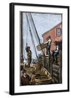 Lobster-Boat Unloaded Along a Maine Pier, circa 1880-null-Framed Giclee Print