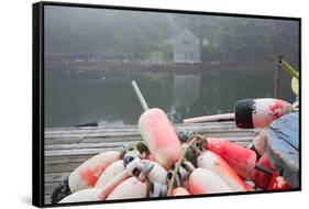 Lobster Trap Buoys and Distant Bdoathouse in Fog, New Harbor, Maine, USA-Lynn M^ Stone-Framed Stretched Canvas