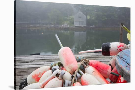 Lobster Trap Buoys and Distant Bdoathouse in Fog, New Harbor, Maine, USA-Lynn M^ Stone-Stretched Canvas