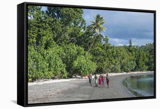 Local boys walking on a pretty black sand volcanic beach, Epi Island, Shepherd Islands, Vanuatu, Pa-Michael Runkel-Framed Stretched Canvas