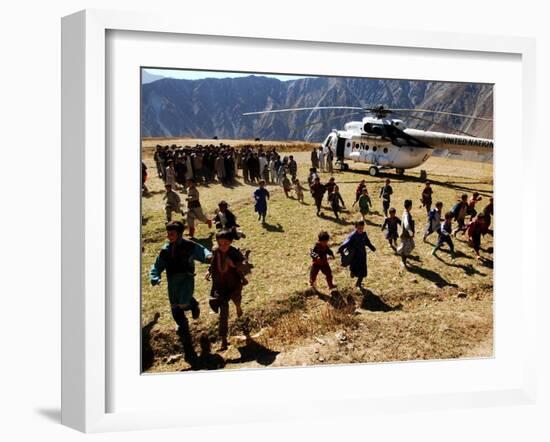 Local Children Run from a Helicopter-null-Framed Photographic Print