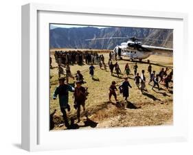 Local Children Run from a Helicopter-null-Framed Photographic Print