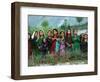 Local Girls Look at a U.N. Workers Unloading Ballot Kits from a U.N. Helicopter-null-Framed Photographic Print