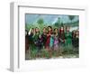 Local Girls Look at a U.N. Workers Unloading Ballot Kits from a U.N. Helicopter-null-Framed Photographic Print