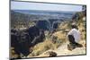 Local Man Looking at a Huge Canyon on the Dixsam Plateau on the Island of Socotra-Michael Runkel-Mounted Photographic Print