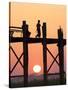 Local Man Walking on the Famous U Bein Teak Bridge at Sunset, Near Mandalay, Myanmar (Burma), Asia-Lee Frost-Stretched Canvas