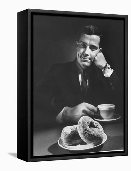 Local Man with Donuts and Coffee-Ralph Morse-Framed Stretched Canvas