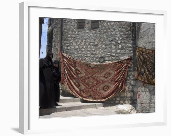 Local Woman Walking Down Steps, Blanket on Wall, Aleppo (Haleb), Syria, Middle East-Christian Kober-Framed Photographic Print