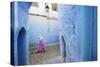 Local Women Walking Through the Blue Streets of the Medina, Chefchaouen, Morocco, Africa-Jordan Banks-Stretched Canvas