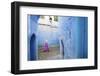 Local Women Walking Through the Blue Streets of the Medina, Chefchaouen, Morocco, Africa-Jordan Banks-Framed Photographic Print