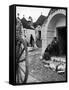 Locals Outside Trulli Homes Made from Limestone Boulders and Feature Conical or Domed Roofs-Alfred Eisenstaedt-Framed Stretched Canvas