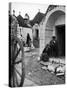 Locals Outside Trulli Homes Made from Limestone Boulders and Feature Conical or Domed Roofs-Alfred Eisenstaedt-Stretched Canvas