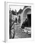 Locals Outside Trulli Homes Made from Limestone Boulders and Feature Conical or Domed Roofs-Alfred Eisenstaedt-Framed Photographic Print