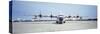 Lockheed C-130 Hercules on an Airport-null-Stretched Canvas