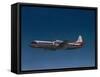 Lockheed L-188 Electra Airplane in Flight-null-Framed Stretched Canvas