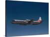 Lockheed L-188 Electra Airplane in Flight-null-Stretched Canvas