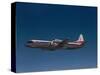 Lockheed L-188 Electra Airplane in Flight-null-Stretched Canvas
