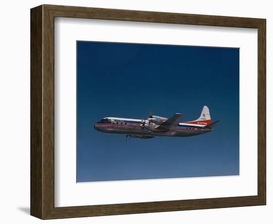 Lockheed L-188 Electra Airplane in Flight-null-Framed Photographic Print