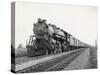 Locomotive Train Moving down Tracks-null-Stretched Canvas