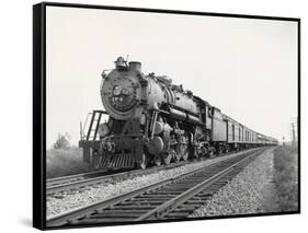 Locomotive Train Moving down Tracks-null-Framed Stretched Canvas