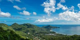 A traditional Thai resort overlooks turquoise water on the tropical island of Koh Tao, Thailand-Logan Brown-Photographic Print