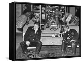 London Auxiliary Fire Service Crew Members Catch Nap on Tail of a Fire Truck-William Vandivert-Framed Stretched Canvas