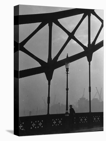 London Bobby in His Wartime Tin Helmet Patrolling the Tower Bridge-Carl Mydans-Stretched Canvas