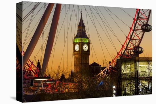 London Eye (Millennium Wheel) frames Big Ben at sunset, London, England, United Kingdom, Europe-Charles Bowman-Stretched Canvas