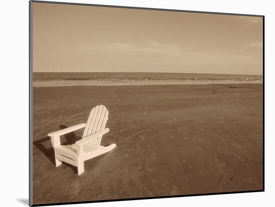 Lone Chair on Empty Beach-null-Mounted Photographic Print