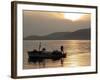 Lone Fisherman Casts His Net at Twilight off the Adriatic Coast-null-Framed Photographic Print