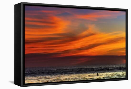 Lone Surfer and Sunset Clouds Off Playa Hermosa Surf Beach, Santa Teresa, Costa Rica-Rob Francis-Framed Stretched Canvas