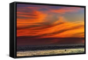 Lone Surfer and Sunset Clouds Off Playa Hermosa Surf Beach, Santa Teresa, Costa Rica-Rob Francis-Framed Stretched Canvas