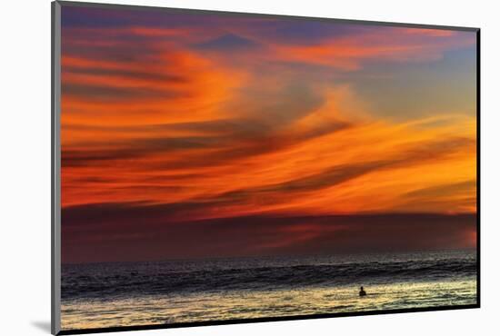 Lone Surfer and Sunset Clouds Off Playa Hermosa Surf Beach, Santa Teresa, Costa Rica-Rob Francis-Mounted Photographic Print