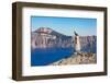 Lone tree trunk over Crater Lake, the deepest lake in the U.S.A., part of the Cascade Range, Oregon-Martin Child-Framed Photographic Print