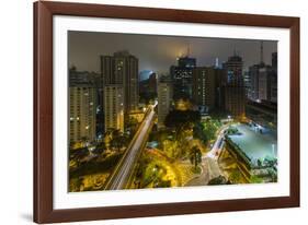 Long exposure night photography during a foggy night in downtown Sao Paulo, Brazil.-James White-Framed Photographic Print