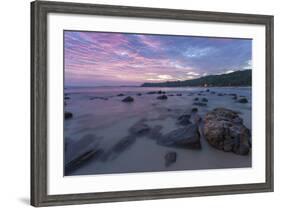 Long Exposure of a Pink Sunset at the Beach During Dusk with Rocks in the Foreground-Charlie-Framed Photographic Print
