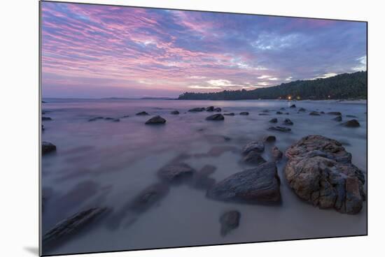 Long Exposure of a Pink Sunset at the Beach During Dusk with Rocks in the Foreground-Charlie-Mounted Photographic Print