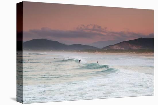 Long Exposure of Surfers Enjoy the Wave on Praia Da Joaquina Beach-Alex Saberi-Stretched Canvas